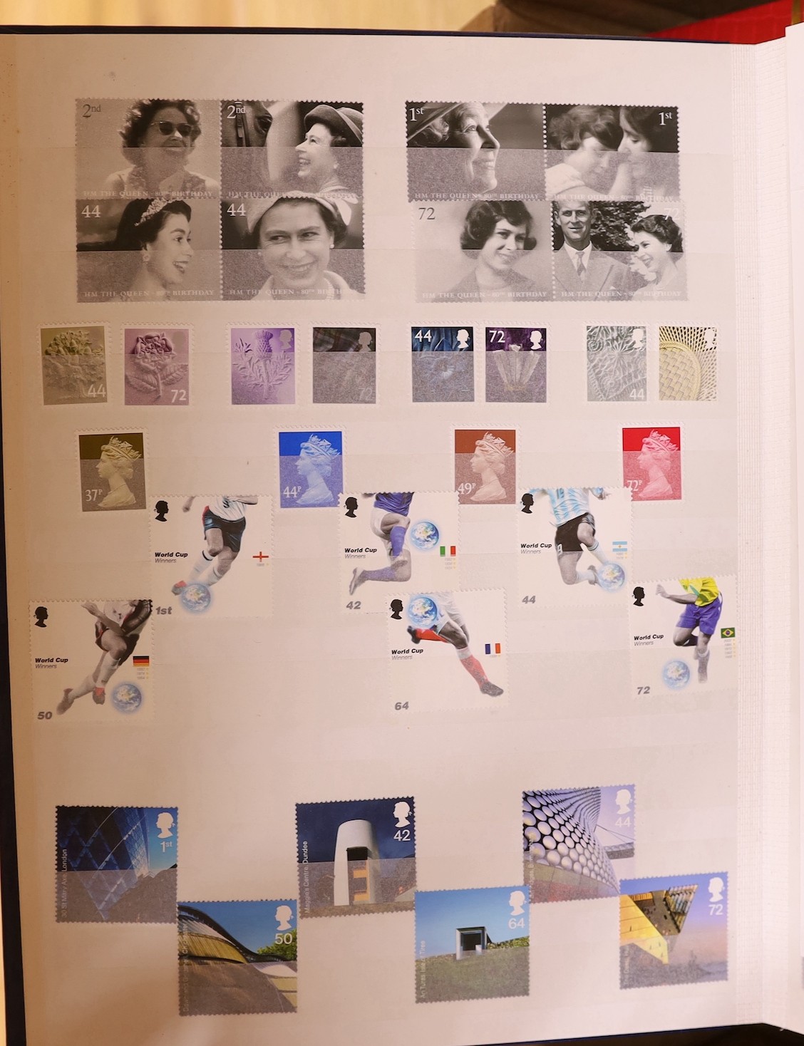 Four stock books of British stamps, QEII mint unused definitives and stamp books, some pre-decimal and two stock books of DDR used and mint unused stamps